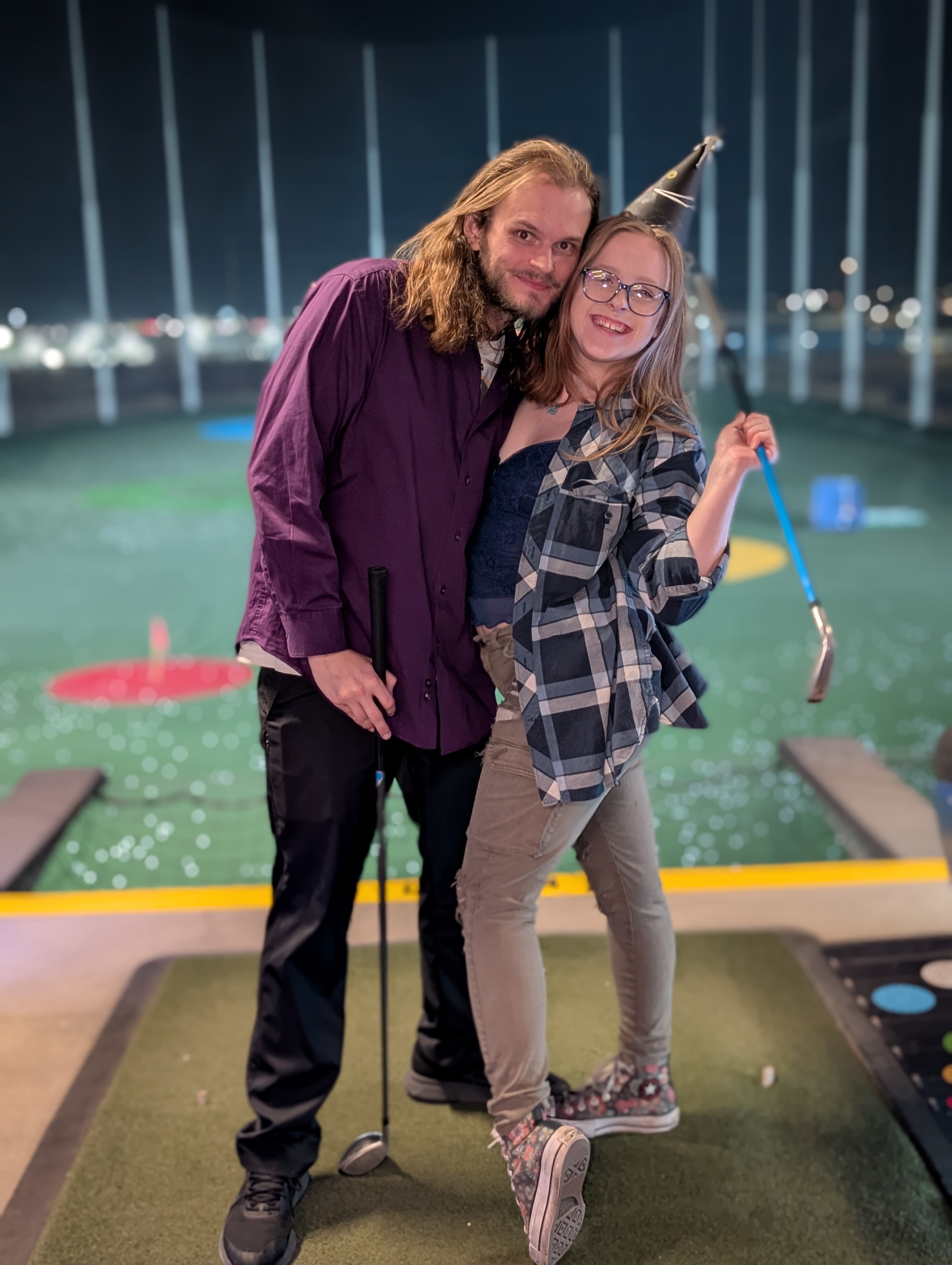 Stockton and his girlfriend at Topgolf