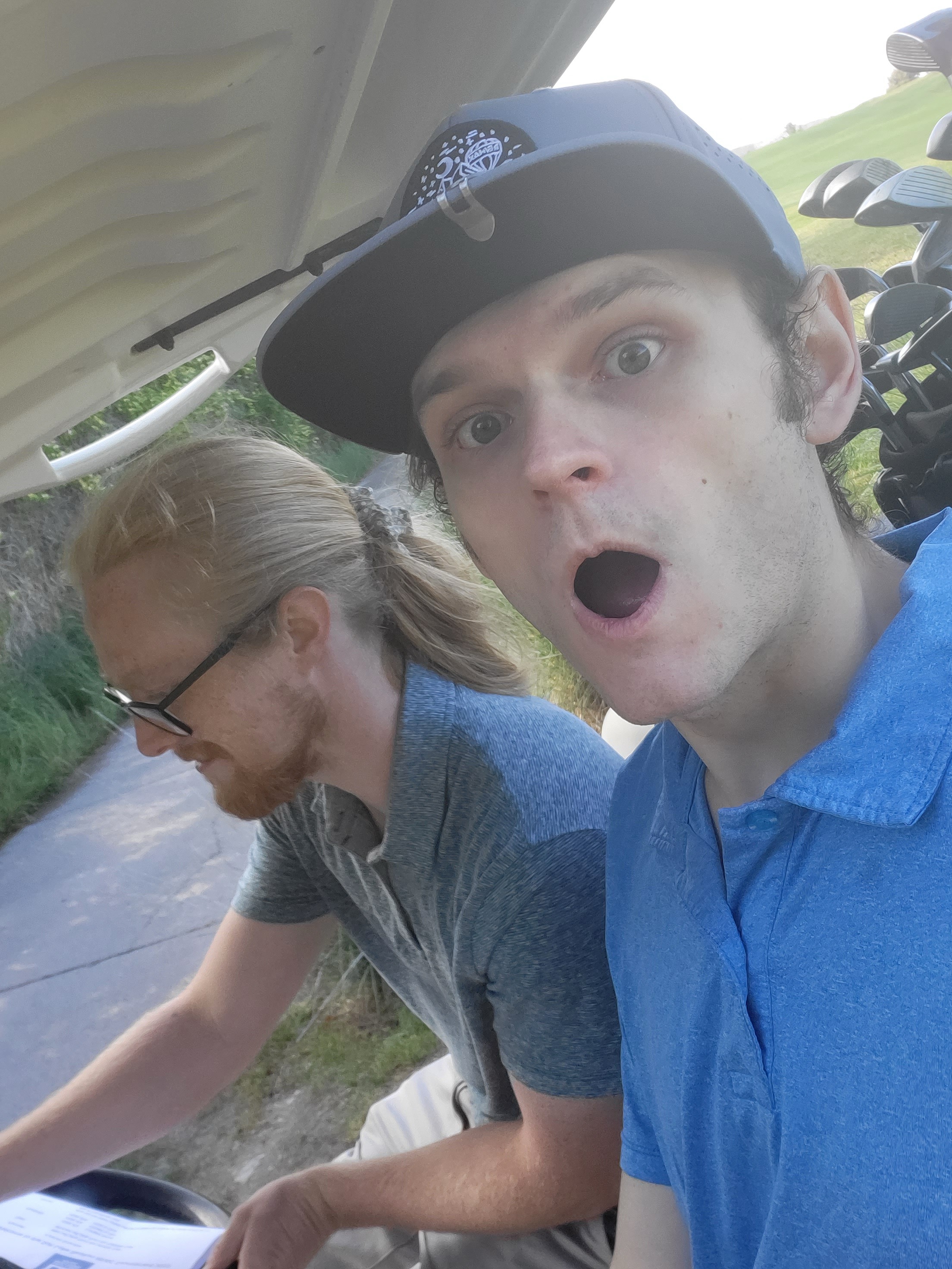 Stockton with his friend Sam on the golf course